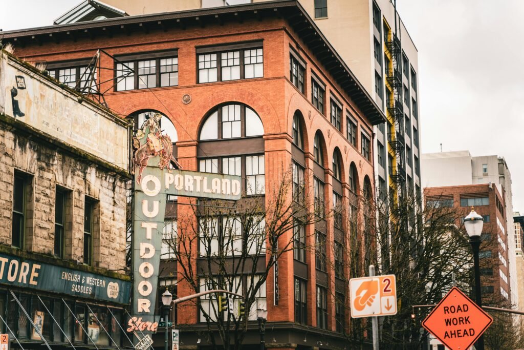 Street view capturing Portland's historic building facade with signage.