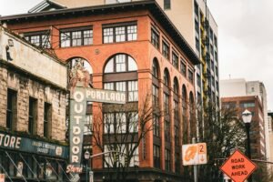 Street view capturing Portland's historic building facade with signage.